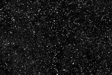 Obraz premium dark textured background resembling outer space with scattered white dots