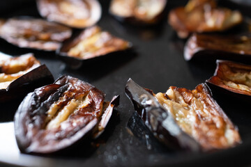 baked and sliced eggplants close-up