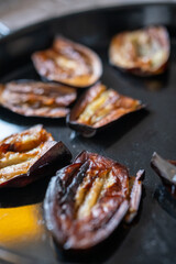 baked and sliced eggplants close-up