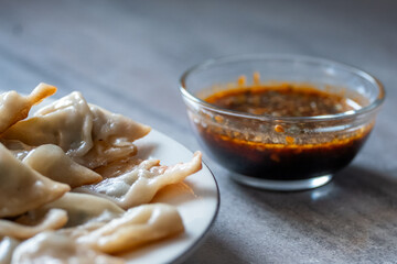 Serving Gyoza dumplings, a local Chinese and Japanese common food