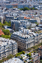 Panoramic view of the roofs of the buildings around the Tour Eiffel and Seine river, Paris, France.