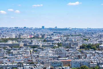 Panoramic view of the roofs of the buildings around the Tour Eiffel and Seine river, Paris, France.