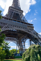 Eiffel tower, close up view, in the city of Paris, France.
