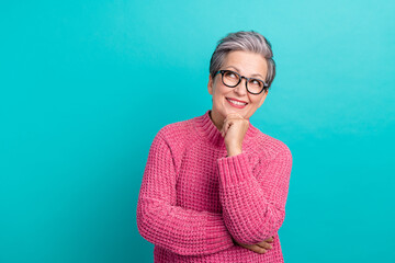 Portrait of smart woman wear pink pullover in eyewear look at interesting proposition empty space...