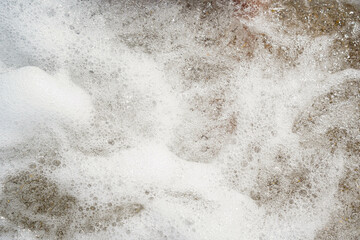 beach waves foam background. bubbles textured