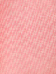 Red silk fabric as an abstract background. Texture
