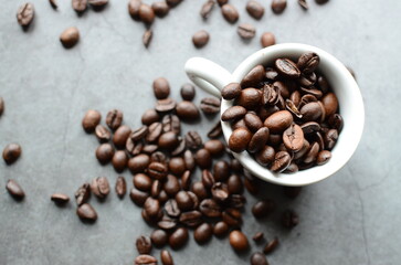 coffee beans on a wooden grey background