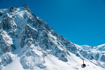 Cabin of the Aiguille du Midi cable car seen from the intermediate station at Plan du Aiguille. In...