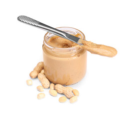 Tasty nut paste in jar, knife and peanuts isolated on white