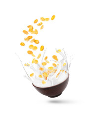 Tasty corn flakes with milk splashing out of bowl isolated on white