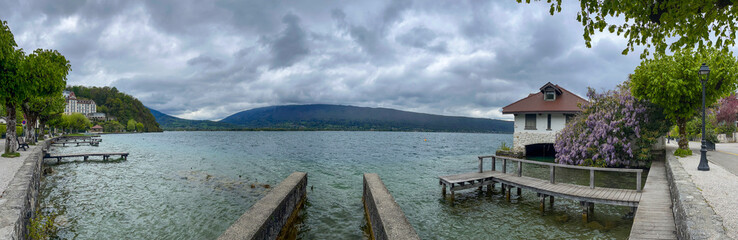 Haute-Savoie, France, 04-25-2024: cloudy day, view of Annecy lake, the second largest in France, known for being the cleanest in Europe due to strict environmental regulations in place since the 1960s