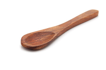 Front view of an empty wooden spoon. Isolated on a white background.
