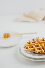 Waffle with honey. Aesthetic composition. Food Styling.