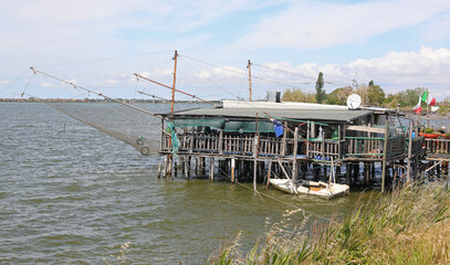 Adriatic Sea fishing huts called Bilancioni or Padelloni built on stilts with big fishing nets