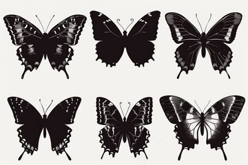 A striking image of six black butterflies on a clean white background. Ideal for nature or insect-themed designs