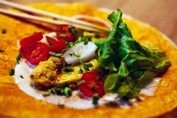 wrap food with ingredients grilled chicken with vegetables