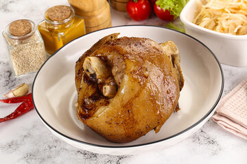 Baked pork knee with spices