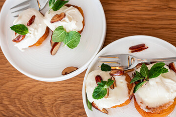 Grilled apricots with buratta cheese, grilled almonds Healthy breakfast 