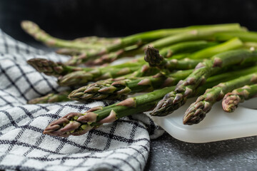 Asparagus fried with garlic in melted butter