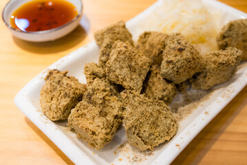 Deep fry stinky tofu on the dish