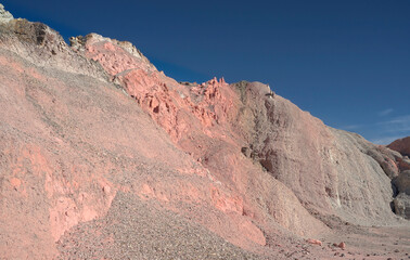 hill of seven colors argentina on a sunny day
