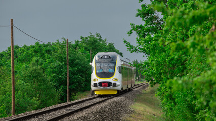 Modern diesel-electric train set driving on the line between Buzet and Pula in croatian istria....