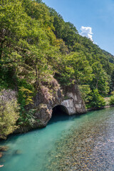 Fototapeta premium The Puente del Rei, is a bridge and border crossing over the Garonne River that connects the Aran Valley in Spain with Haute-Garonne in France