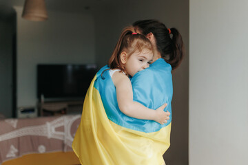 Symbolic Serenity Mother and Child Embrace with Ukrainian Flag
