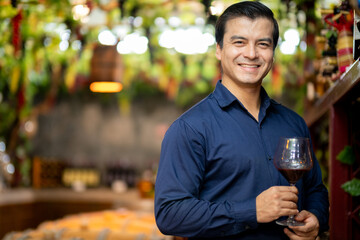 Smart Businessman Enjoying Wine Tasting in Winery Store - Relaxed, Confident, and Stylish,...
