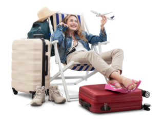 Tourist woman in travel attire, on deck chair with trolley suitcases, show a model airplane, using mobile phone. Summer beach holiday, flight and vacation travel booking. Travel influencer lifestyle