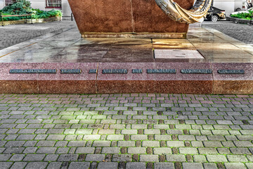 Lviv, Ukraine - November 2, 2023: Inscription on the Monument to the Saint George in Lviv. Embossed text on a granite pedestal To Law Enforcement Officers of Ukraine Who Died in the Line of Duty