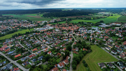 Aerial view of the city Lichtenau in spring on a cloudy day