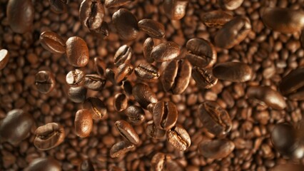 Freeze motion of flying coffee beans on pile.