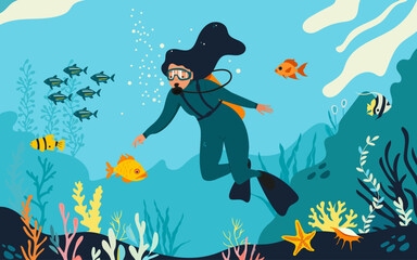 Diving. Undersea world. A girl with diving equipment swims underwater.
