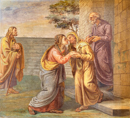 MILAN, ITALY - MARCH 6, 2024: The fresco of Visiation in the church Basilica di Sant Eustorgio by unknown artist. © Renáta Sedmáková