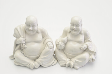 Still life with two white Buddhas