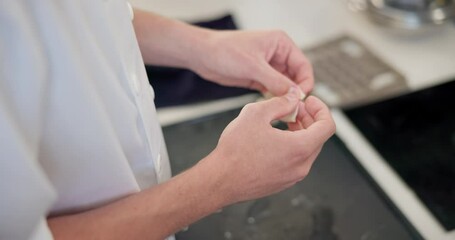 Hands, person, and chef in restaurant with dough for baking pie for customer of client in the kitchen. Food, ingredients and passion as cook with talent, skill and passion for hospitality industry