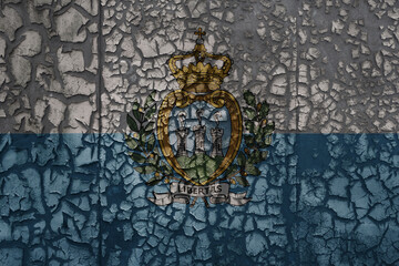 flag of san marino on a grunge vintage metal rusty cracked wall background