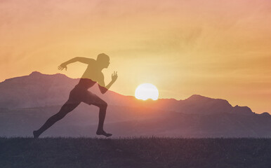 silhouette of a person running, goal setting, fitness and health 