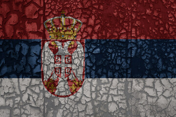 flag of serbia on a grunge vintage metal rusty cracked wall background
