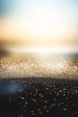 Abstract luxury background, black and gold, bokeh effects, sparkles.