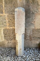 Ancient Greek stone carving in medieval city of Rhodes, Greece