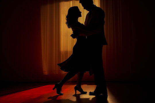 A subtle display of tango dancing in a softly lit ambiance, featuring the sight of intertwined legs.