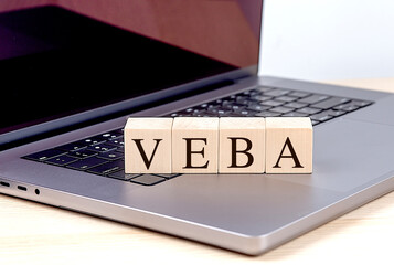 VEBA word on wooden block on a laptop , business concept