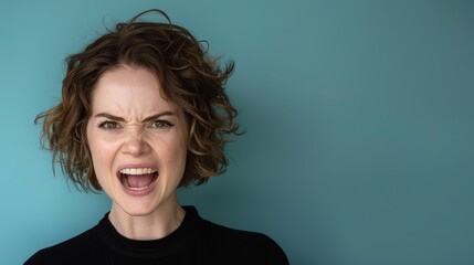   A person with a surprised expression, facing a blue wall Blue wall visible behind