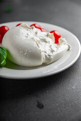 buffalo burrata Cooking appetizer meal food snack on the table copy space food background rustic top view keto or paleo diet vegetariano or paleo diet vegetarian