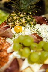Table decorated with food and salads. Plenty of food on the table. Business event with a table full of food and salads. Catering table full of tasty food.
