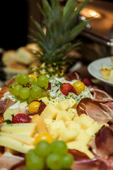 Table decorated with food and salads. Plenty of food on the table. Business event with a table full of food and salads. Catering table full of tasty food.
