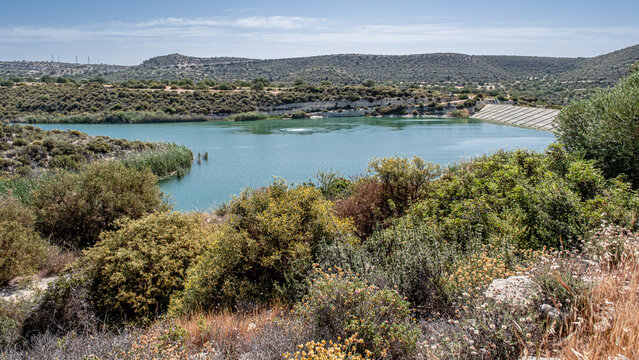 View of Symvoulos Dam and the water Reservoir, as seen from the circular walk around the lake, located near Satira village, west of Limassol, Cyprus  