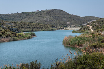 View of Symvoulos Dam and the water Reservoir, as seen from the circular walk around the lake,...